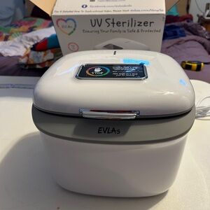 NWOT EVLAs UV Sterilizer Box